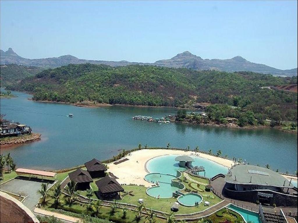 Aamby Valley City Lonavala Dış mekan fotoğraf View of the lake at the resort